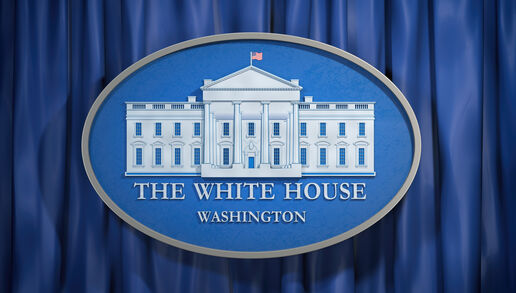 The White House Washington sign on blue background.